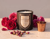 Atelier Candela Moroccan Rose luxury scented candle with fresh roses, dried rosebuds, and a hammered copper cup